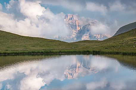 Pelmo mount reflected on Baste lake, Mondeval, Dolomites, Italy