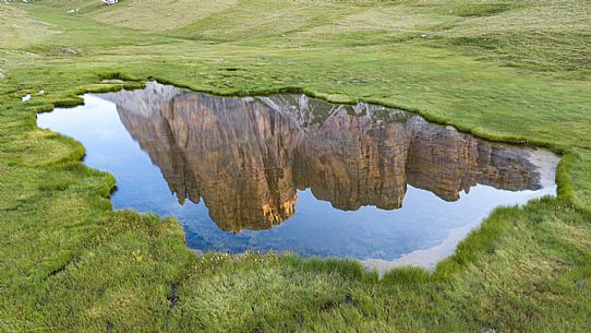 Lastoi De Formin mount reflected on Baste lake, Mondeval, Dolomites, Italy