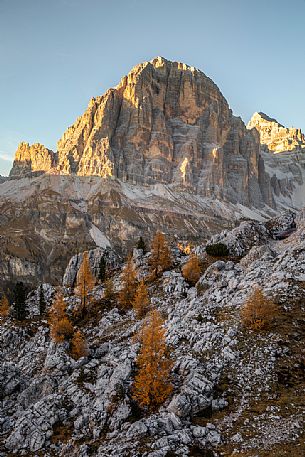 The Tofana di Rozes illuminated by the last light of an autumn afternoon, Dolomites, Cortina d'Ampezzo, Italy