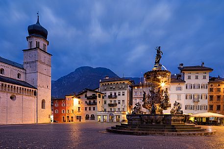 Duomo square with the Fountain of Nettuno at the twilight, Trento, Trentino Alto Adige, Italy Duomo square with the Fountain of Nettuno at the twilight, Trento, Trentino Alto Adige, Italy