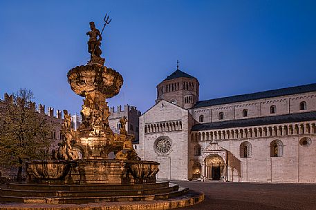 Duomo square with the Fountain of Nettuno and the Cathedral of San Vigilio in the background at twilight, Trento, Trentino Alto Adige, Italy