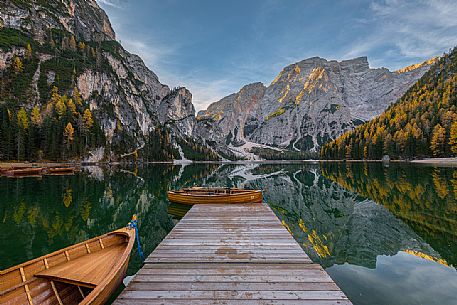Autumn sunrise on the Braies lake, Dolomites, Pusteria Valley, Italy