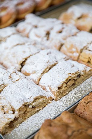 Strudel freshly baked at the festival of bread and strudel of Bressanone, Isarco valley, Trentino Alto Adige, Italy, Europe