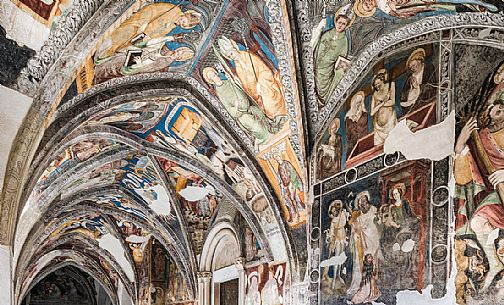 The cloister of the Duomo church with its Gothic frescoes, Bressanone, Isarco valley, Trentino Alto Adige, Italy