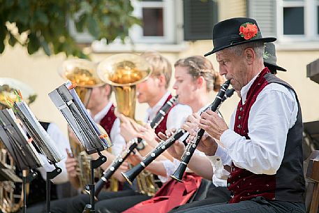 Tyrolean music band during the chestnut festival, Torgellen, in Chiusa village, Isarco valley, Trentino Alto Adige, Italy, Europe