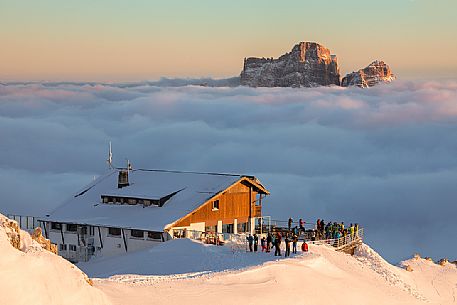The Lagazuoi refuge and the Pelmo Mount above a sea of clouds at sunset, Cortina d'Ampezzo, dolomites, Veneto, Italy, Europe