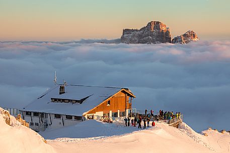 The Lagazuoi refuge and the Pelmo Mount above a sea of clouds at sunset, Cortina d'Ampezzo, dolomites, Veneto, Italy, Europe The Lagazuoi refuge and the Pelmo Mount above a sea of clouds at sunset, Cortina d'Ampezzo, dolomites, Veneto, Italy, Europe