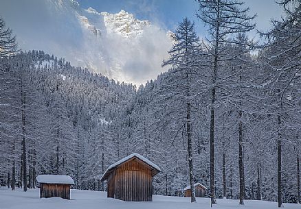 Barns in the Fiscalina valley after an intense snowfall, Sesto, Pusteria valley, Trentino Alto Adige, Italy, Europe