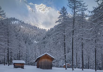 Barns in the Fiscalina valley after an intense snowfall, Sesto, Pusteria valley, Trentino Alto Adige, Italy, Europe Barns in the Fiscalina valley after an intense snowfall, Sesto, Pusteria valley, Trentino Alto Adige, Italy, Europe