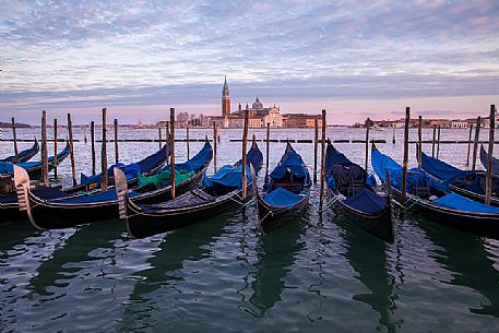 Venice Gondolas in Saint Marco Square with the Church of San Giorgio Maggiore on background, Venice, Italy, Europe