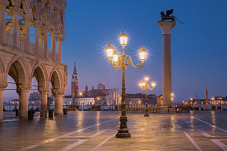 San Marco square by night with the church of Saint Giorgio Maggiore on background, Venice, Italy, Europe