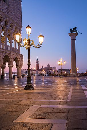 San Marco square by night with the church of Saint Giorgio Maggiore on background, Venice, Italy, Europe
