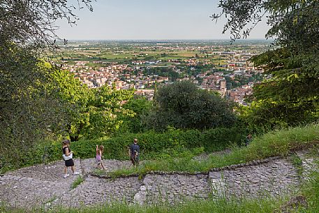 Tourists walk the promenade that leads from the Upper castle or Castello Superiore to the town of Marostica, Vicenza, Veneto, Italy, Europe Tourists walk the promenade that leads from the Upper castle or Castello Superiore to the town of Marostica, Vicenza, Veneto, Italy, Europe