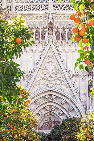 Portal of the Seville Cathedral or Church of Santa Maria della Sede from the Patio de los Naranjos, the park of the cathedral, Seville, Spain, Europe