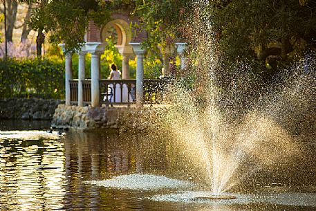 The duck pond, in the background the pavilion of Alfonso XII in the Park of Maria Luisa ( Parque de Maria Luisa ), Seville, Spain, Europe