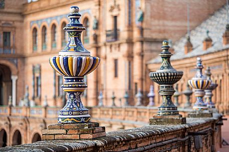 Exposed bricks, marble and ceramic in the Plaza de Espana, one of the most spectacular architectural spaces in the city of Seville and neo-Moorish architecture, Seville, Spain, Europe Exposed bricks, marble and ceramic in the Plaza de Espana, one of the most spectacular architectural spaces in the city of Seville and neo-Moorish architecture, Seville, Spain, Europe