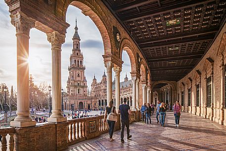 Tourists walking in the Plaza de Espana, Seville, Spain, Europe
