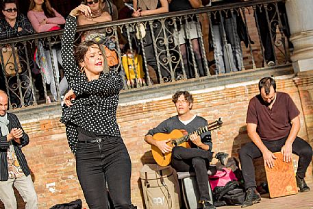 Flamenco dance outdoors in the Plaza de Espana, Seville, Spain, Europe Flamenco dance outdoors in the Plaza de Espana, Seville, Spain, Europe