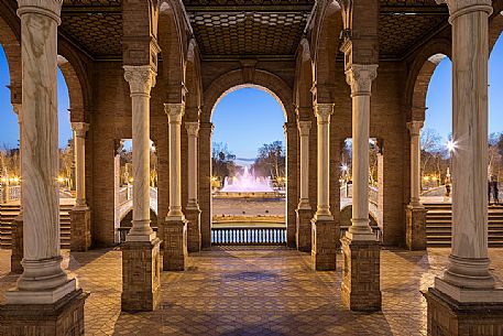 Sunlight and shadows through the pillars ot the Plaza de Espana, Seville, Andalusia, Spain, Europe Sunlight and shadows through the pillars ot the Plaza de Espana, Seville, Andalusia, Spain, Europe