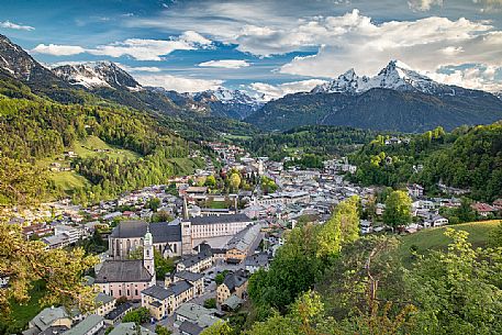 View from above of the village of Berchtesgaden located in the Baviera's Land, famous for holiday and spa resort, in the background the Watzmann Mountain, Bayern, Germany, Europe