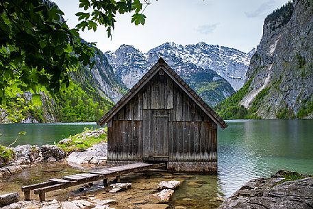 Fishing hut on lake Obersee against Watzmann mountain, Berchtesgaden National Park, Upper Bavaria. Germany