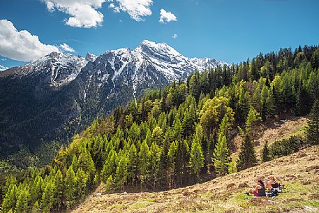 Trekkers enjoy the panoramic view along the path leading to Hintersee, Berchtesgaden National Park, Ramsau, Bayern, Germany, Europe Trekkers enjoy the panoramic view along the path leading to Hintersee, Berchtesgaden National Park, Ramsau, Bayern, Germany, Europe