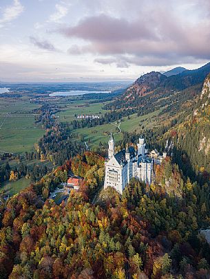 Neuschwanstein Castle, Schloss Neuschwanstein and lake Alpsee in autumn, Schwangau near Fuessen, Bayern, Germany, Europe Neuschwanstein Castle, Schloss Neuschwanstein and lake Alpsee in autumn, Schwangau near Fuessen, Bayern, Germany, Europe