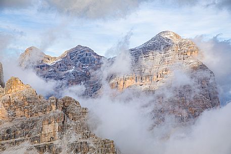 The Tofana di Rozes sourranded by clouds, Cortina d' Ampezzo, dolomites, Veneto, Italy, Europe The Tofana di Rozes sourranded by clouds, Cortina d' Ampezzo, dolomites, Veneto, Italy, Europe