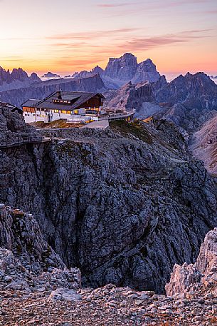 Lagazuoi Refuge with Pelmo Mount on background at dawn, Cortina d'Ampezzo, dolomites, Veneto, Italy Lagazuoi Refuge with Pelmo Mount on background at dawn, Cortina d'Ampezzo, dolomites, Veneto, Italy