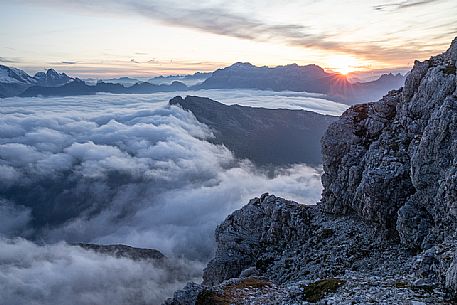 Clouds wrap around the landscape nearby Lagazuoi Refuge, Cortina d'Ampezzo, dolomites, Veneto, Italy, Europe