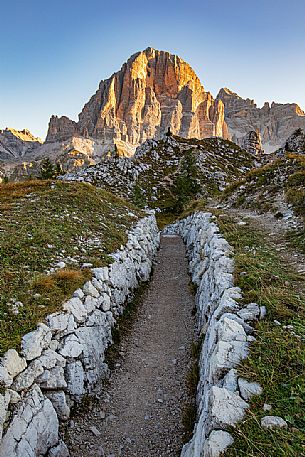 Trenches of the World War near Cinque Torri mount, on the background the Tofana di Rozes, Cortina d'Ampezzo, dolomites, Veneto, Italy, Europe Trenches of the World War near Cinque Torri mount, on the background the Tofana di Rozes, Cortina d'Ampezzo, dolomites, Veneto, Italy, Europe