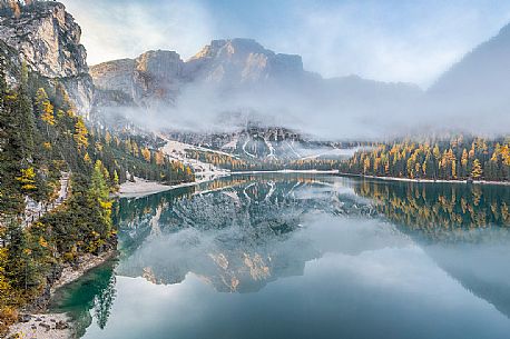 Braies lake with autumn colors, Pusteria valley, dolomites, Trentino Alto Adige, South Tyrol, Italy, Europe