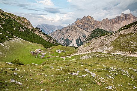 Colli Alti hut from above and in the background the Croda del Becco peak, Braies valley, dolomites, Trentino Alto Adige, Italy, Europe Colli Alti hut from above and in the background the Croda del Becco peak, Braies valley, dolomites, Trentino Alto Adige, Italy, Europe