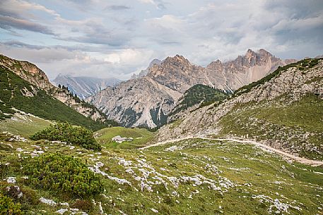 Colli Alti hut from above and in the background the Croda del Becco peak, Braies valley, dolomites, Trentino Alto Adige, Italy, Europe Colli Alti hut from above and in the background the Croda del Becco peak, Braies valley, dolomites, Trentino Alto Adige, Italy, Europe