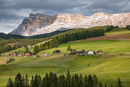The fields in La Villa and Sasso della Croce mountain (Kreuzkofel) in the background, Badia valley, dolomites, Trenino Alto Adige, Italy, Europe The fields in La Villa and Sasso della Croce mountain (Kreuzkofel) in the background, Badia valley, dolomites, Trenino Alto Adige, Italy, Europe