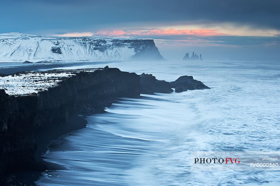 This image was taken from above a cliff and portraits the southern Icelandic coast during a windy day.