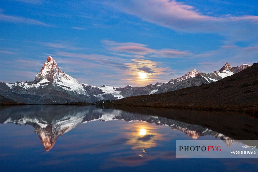 The fusion of sunrise and moonset light generated a fascinating mood at stellisee Lake