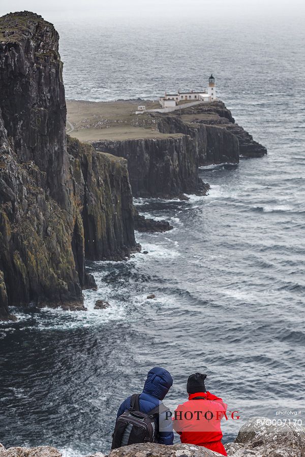 Two hikers at Neist Point, United Kingdom, UK, Scotland, Inner Hebrides , Isle of Skye 