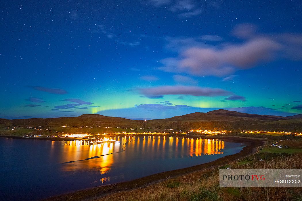 A very special and rare moment at Uig. The Aurora Borealis shows up in the sky, above the Uig Harbour