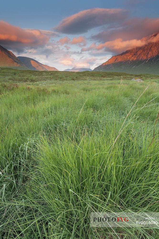 A sunny morning and warm light on the peak of the hills