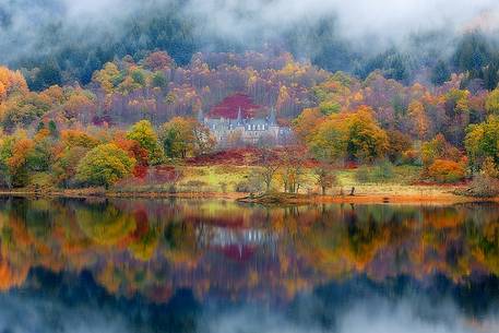 Tigh Mor hotel surrounded by fog in autumn in the Trossachs