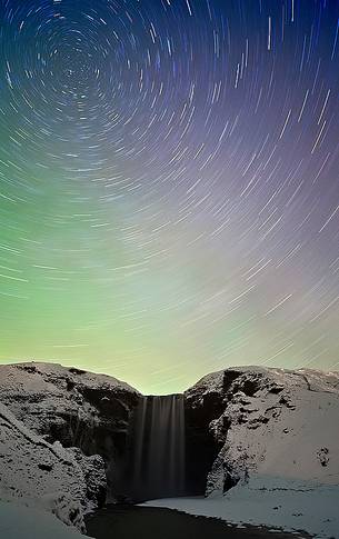 Star trail caught above Skogafoss at night time.