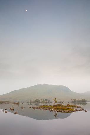 Misty morning and moon at loch na claise