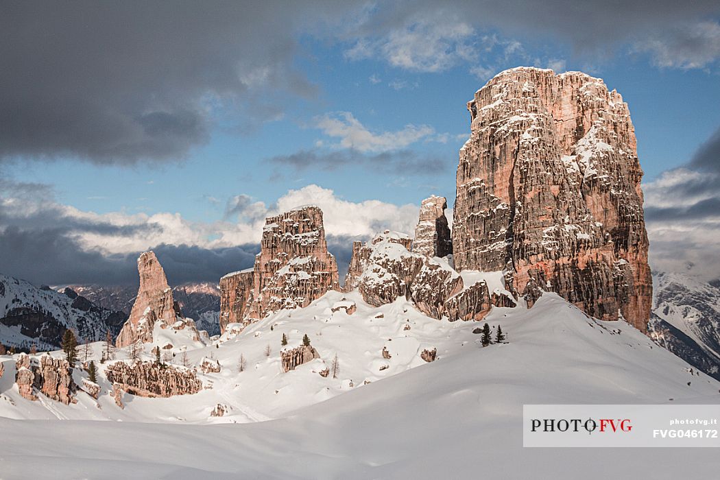 Scenic view of Cinque Torri mount peak covered in snow from Rifugio Scoiattoli during a sunny winter day, Cortina d'Ampezzo, Dolomites, Veneto, Italy, Europe