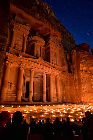 Bedouin's Candle lights show at the bottom of the Al Khazneh or Treasury at night in Petra, Jordan