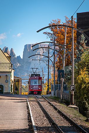 View of a ancient train of the Railway Renon in the Soprabolzano station, with Sciliar peaks in the foreground, Soprabolzano, South Tyrol, dolomites, Italy, Europe