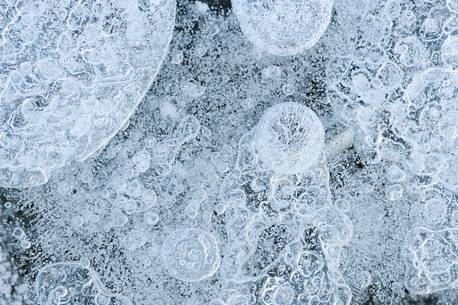 the air trapped in the ice creates fantastic designes