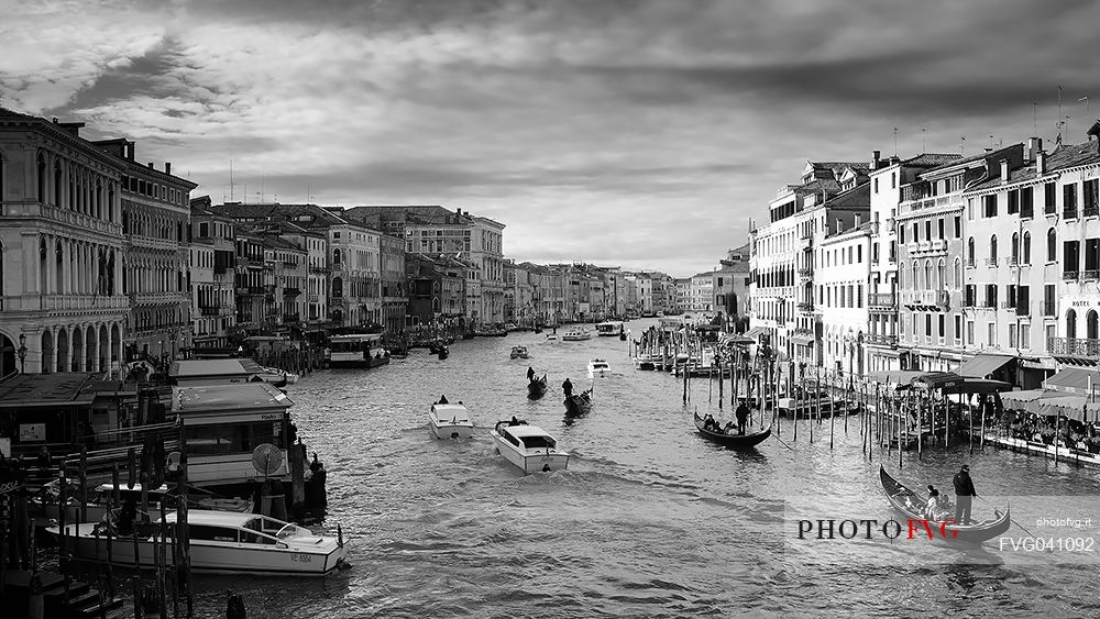 The Palazzi of the Grand Canal with boats and typical gondolas from Rialto bridge, Venice, Italy, Europe
