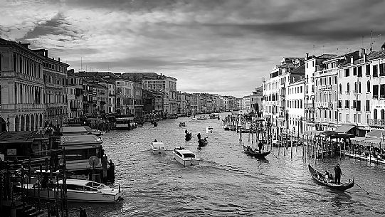 The Palazzi of the Grand Canal with boats and typical gondolas from Rialto bridge, Venice, Italy, Europe