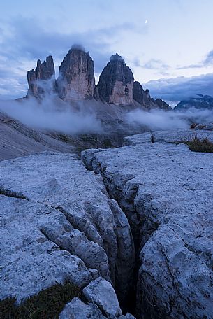 Twilight on the Tre Cime di Lavaredo peaks in a summer evening, dolomites, Trentino Alto Adige, Italy, Europe